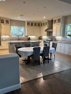 Dining room, Interior, Kitchen, Recessed Lighting, Stainless Steel Appliances, Wood Texture Flooring