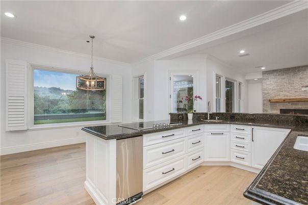 Fireplace, Interior, Kitchen, Pendant Lights, Recessed Lighting, Stone Walls, Wood Texture Flooring