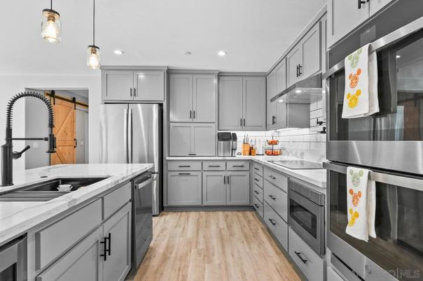 Interior, Kitchen, Pendant Lights, Recessed Lighting, Stainless Steel Appliances, Wood Texture Flooring