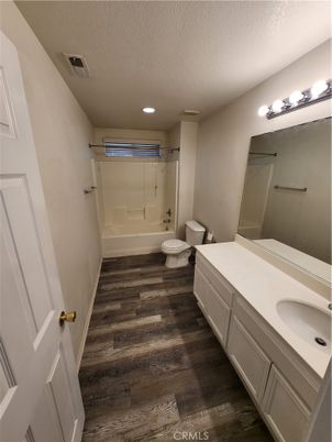 Bathroom, Dual Sink Vanities, Interior, Recessed Lighting, Wood Texture Flooring