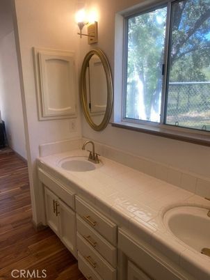 Bathroom, Dual Sink Vanities, Interior, Tile Countertops, Wood Texture Flooring