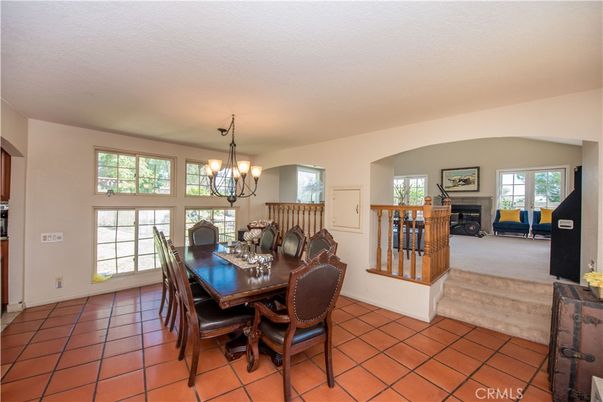 Chandelier, Dining room, Fireplace, Interior, Pendant Lights