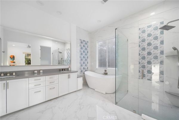 Bathroom, Dual Sink Vanities, Free Standing Baths, Glass Shower, Interior, Marble, Marble Walls, Recessed Lighting