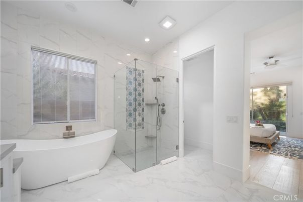 Bathroom, Free Standing Baths, Glass Shower, Interior, Marble, Marble Walls, Recessed Lighting