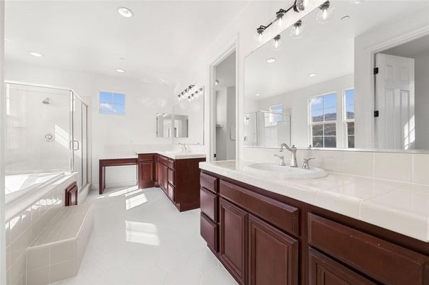 Bathroom, Dual Sink Vanities, Glass Shower, Interior, Recessed Lighting, Tile Countertops