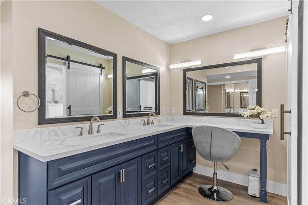 Bathroom, Dual Sink Vanities, Interior, Recessed Lighting, Wood Texture Flooring