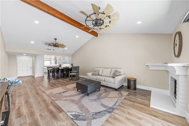 Fireplace, Interior, Living room, Pendant Lights, Recessed Lighting, Wooden Beams, Wood Texture Flooring
