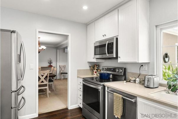 Dining room, Interior, Kitchen, Recessed Lighting, Stainless Steel Appliances, Wood Texture Flooring