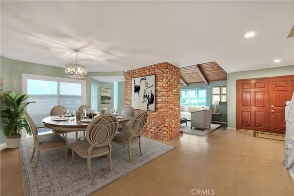 Dining room, Fireplace, Interior, Living room, Recessed Lighting, Stone Walls, Wood Texture Flooring