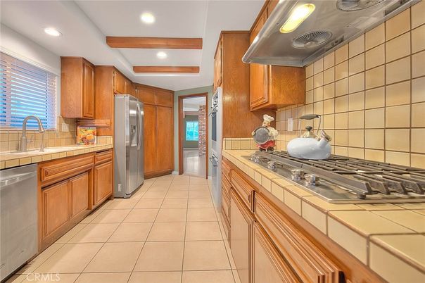 Interior, Kitchen, Recessed Lighting, Stainless Steel Appliances, Tile Countertops