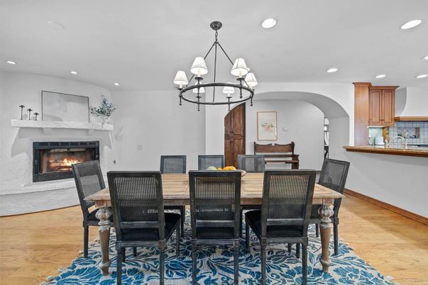 Chandelier, Dining room, Fireplace, Interior, Recessed Lighting, Wood Texture Flooring