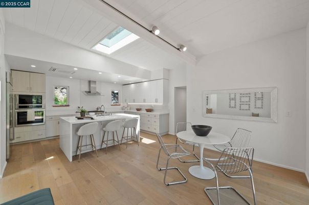 Dining room, Interior, Kitchen, Recessed Lighting, Stainless Steel Appliances, Wood Texture Flooring