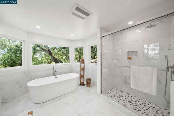 Bathroom, Free Standing Baths, Glass Shower, Interior, Marble, Marble Walls, Recessed Lighting