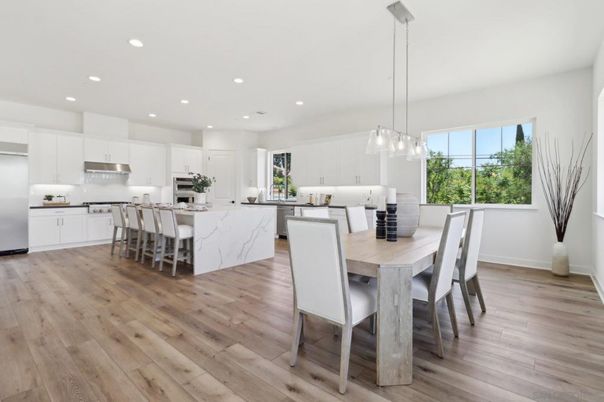 Dining room, Interior, Kitchen, Pendant Lights, Recessed Lighting, Stainless Steel Appliances, Wood Texture Flooring