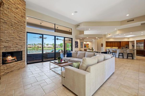 Fireplace, Interior, Kitchen, Living room, Recessed Lighting, Stainless Steel Appliances, Stone Walls