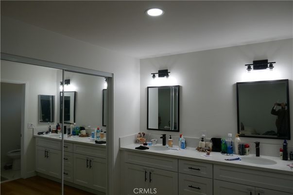 Bathroom, Dual Sink Vanities, Interior, Recessed Lighting, Wood Texture Flooring