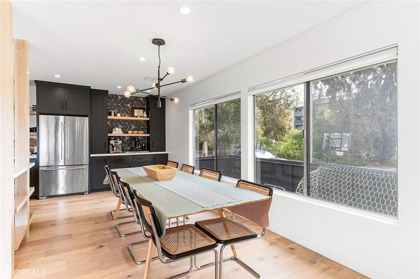 Dining room, Interior, Kitchen, Pendant Lights, Recessed Lighting, Stainless Steel Appliances, Wood Texture Flooring