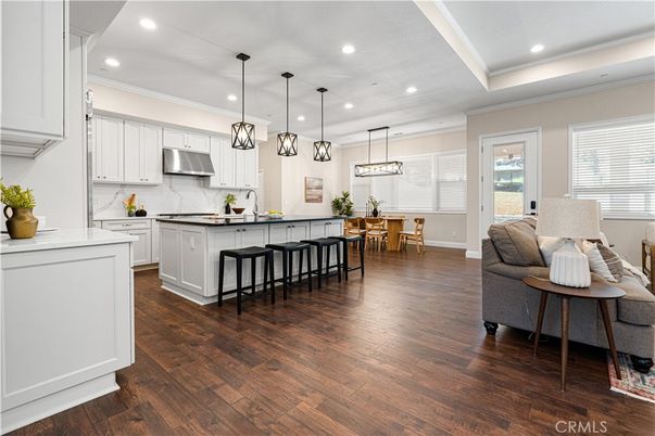Dining room, Interior, Kitchen, Living room, Pendant Lights, Recessed Lighting, Stainless Steel Appliances, Wood Texture Flooring