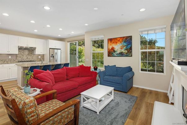 Fireplace, Interior, Kitchen, Living room, Recessed Lighting, Stainless Steel Appliances, Wood Texture Flooring