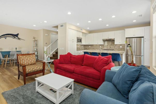 Dining room, Interior, Kitchen, Living room, Recessed Lighting, Stainless Steel Appliances, Wood Texture Flooring