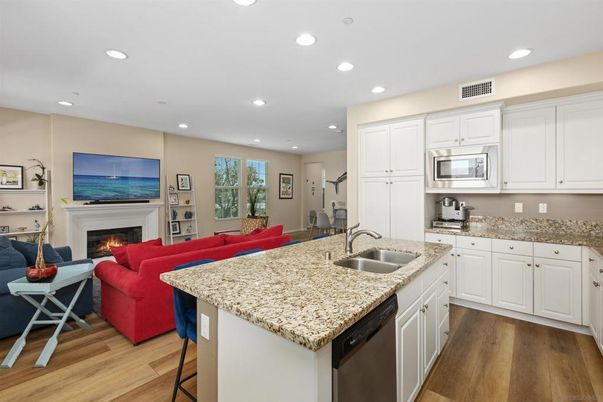 Fireplace, Interior, Kitchen, Living room, Recessed Lighting, Wood Texture Flooring