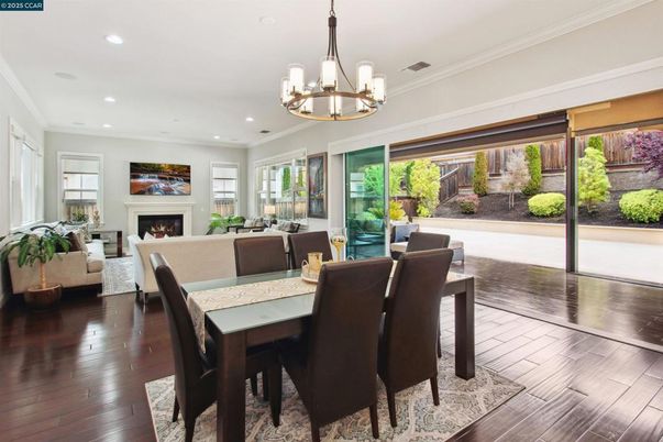 Chandelier, Dining room, Fireplace, Interior, Living room, Recessed Lighting, Wood Texture Flooring