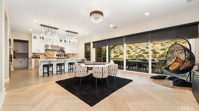 Dining room, Interior, Kitchen, Pendant Lights, Recessed Lighting, Stainless Steel Appliances, Wood Texture Flooring