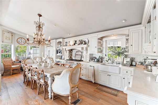 Chandelier, Dining room, Interior, Kitchen, Recessed Lighting, Stainless Steel Appliances, Wood Texture Flooring