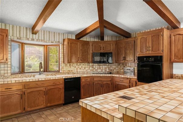 Interior, Kitchen, Tile Countertops, Wooden Beams