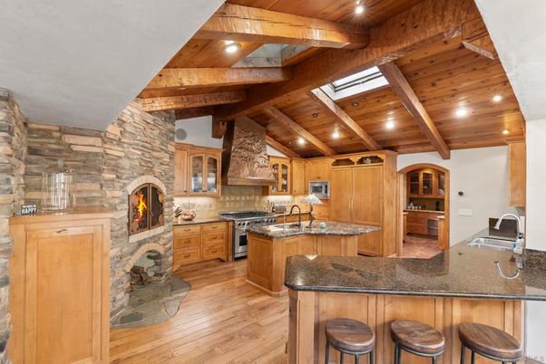 Fireplace, Interior, Kitchen, Recessed Lighting, Stainless Steel Appliances, Stone Walls, Wooden Beams, Wooden Ceilings, Wood Texture Flooring