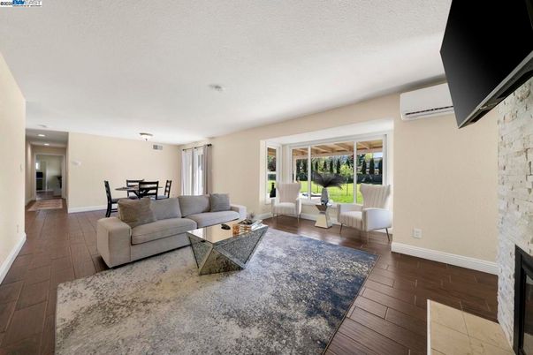 Dining room, Fireplace, Interior, Living room, Pendant Lights, Recessed Lighting, Stone Walls, Wood Texture Flooring