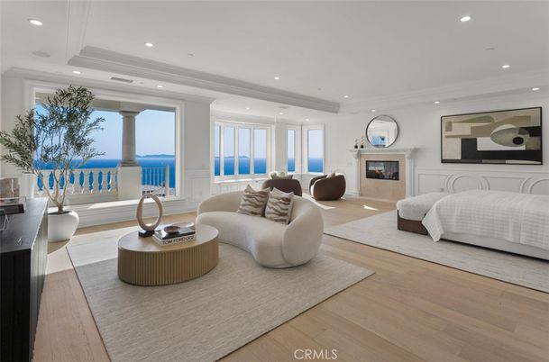 Bedroom, Fireplace, Interior, Living room, Recessed Lighting, Water, Wood Texture Flooring