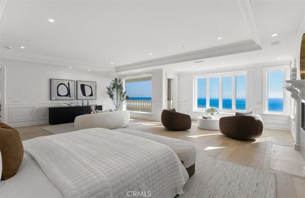 Bedroom, Fireplace, Interior, Recessed Lighting, Water, Wood Texture Flooring