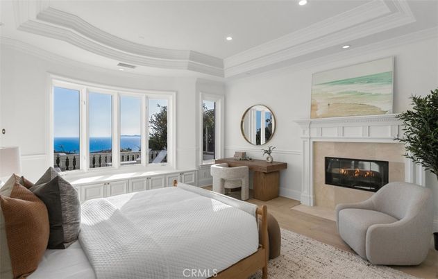 Bedroom, Fireplace, Interior, Recessed Lighting, Water, Wood Texture Flooring