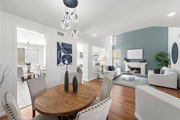 Dining room, Fireplace, Interior, Living room, Pendant Lights, Recessed Lighting, Wood Texture Flooring