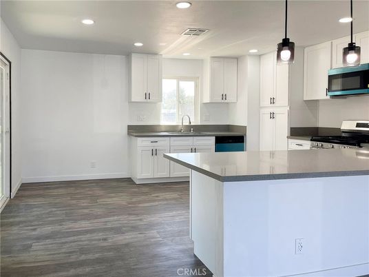 Interior, Kitchen, Pendant Lights, Recessed Lighting, Stainless Steel Appliances, Wood Texture Flooring
