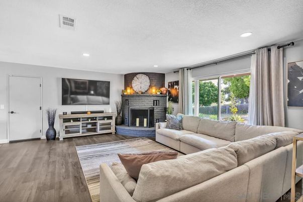 Fireplace, Interior, Living room, Recessed Lighting, Wood Texture Flooring