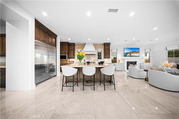 Fireplace, Interior, Kitchen, Living room, Recessed Lighting, Stainless Steel Appliances