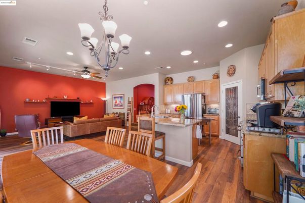 Chandelier, Dining room, Interior, Kitchen, Living room, Recessed Lighting, Stainless Steel Appliances, Wood Texture Flooring