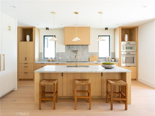Interior, Kitchen, Marble Walls, Pendant Lights, Recessed Lighting, Stainless Steel Appliances, Wood Texture Flooring