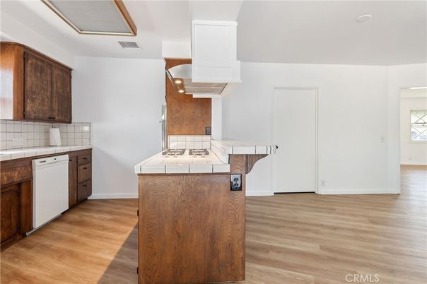 Interior, Kitchen, Tile Countertops, Wood Texture Flooring
