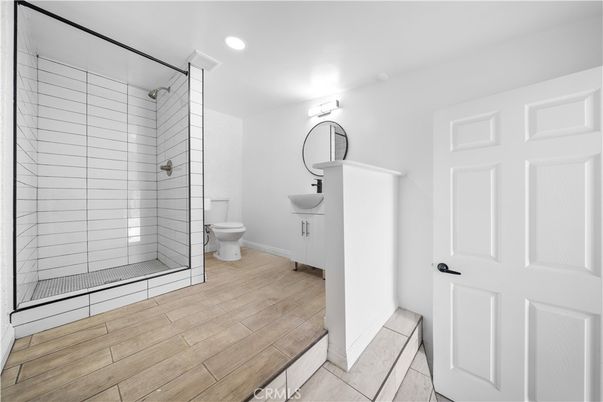 Bathroom, Glass Shower, Interior, Recessed Lighting, Wood Texture Flooring