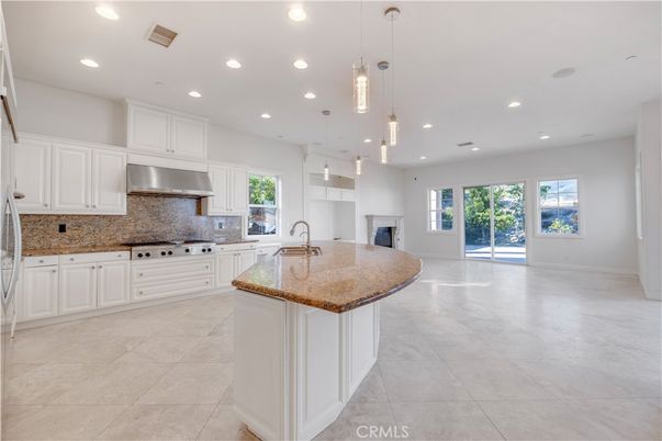 Fireplace, Interior, Kitchen, Pendant Lights, Recessed Lighting, Stainless Steel Appliances