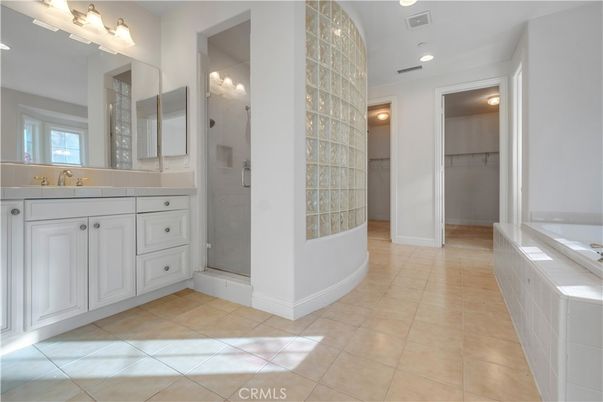Bathroom, Dual Sink Vanities, Glass Shower, Interior, Recessed Lighting, Tile Countertops