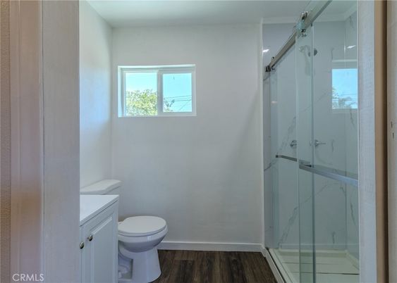 Bathroom, Glass Shower, Interior, Marble Walls, Wood Texture Flooring