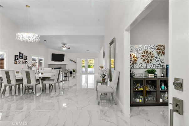 Chandelier, Dining room, Fireplace, Interior, Marble, Pendant Lights