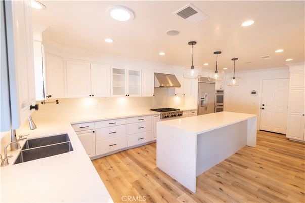 Interior, Kitchen, Pendant Lights, Recessed Lighting, Stainless Steel Appliances, Wood Texture Flooring
