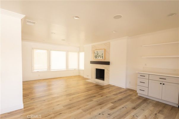 Empty room, Fireplace, Interior, Recessed Lighting, Wood Texture Flooring