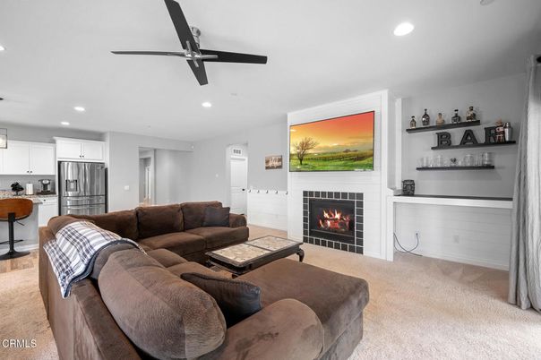Fireplace, Interior, Kitchen, Living room, Recessed Lighting, Stainless Steel Appliances