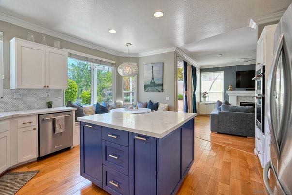 Dining room, Fireplace, Interior, Kitchen, Pendant Lights, Recessed Lighting, Stainless Steel Appliances, Wood Texture Flooring